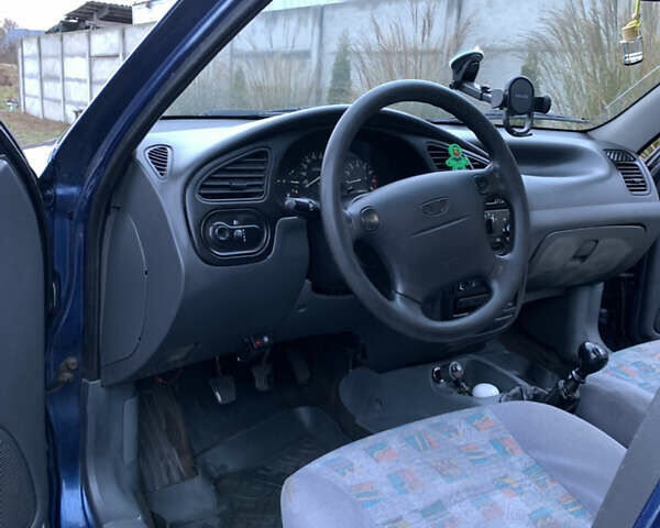 Синій Деу Ланос, об'ємом двигуна 1.5 л та пробігом 233 тис. км за 1500 $, фото 12 на Automoto.ua