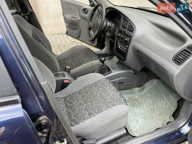 Деу Ланос 2005 у Василькове на Automoto.ua Синій Деу Ланос, об'ємом двигуна 1.5 л та пробігом 140 тис. км за 2650 $, фото 13 на Automoto.ua