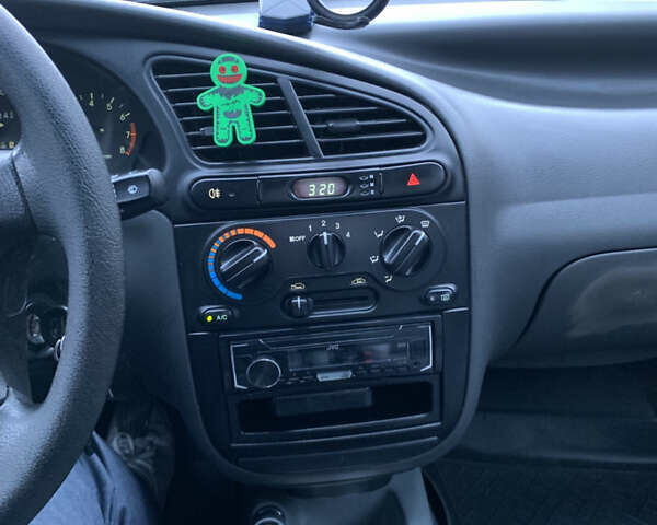 Синій Деу Ланос, об'ємом двигуна 1.5 л та пробігом 233 тис. км за 1500 $, фото 18 на Automoto.ua