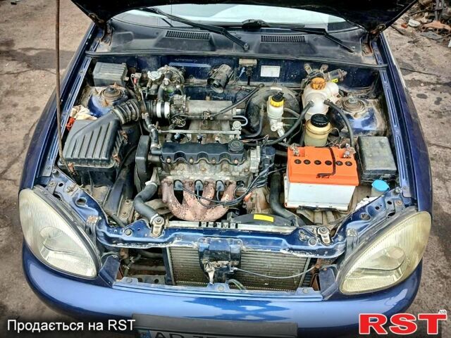 Синий Дэу Ланос, объемом двигателя 1.5 л и пробегом 220 тыс. км за 1450 $, фото 2 на Automoto.ua