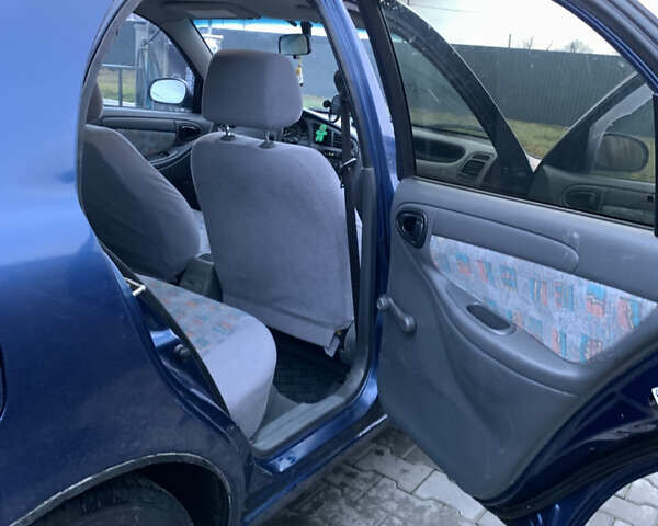 Синій Деу Ланос, об'ємом двигуна 1.5 л та пробігом 233 тис. км за 1500 $, фото 9 на Automoto.ua