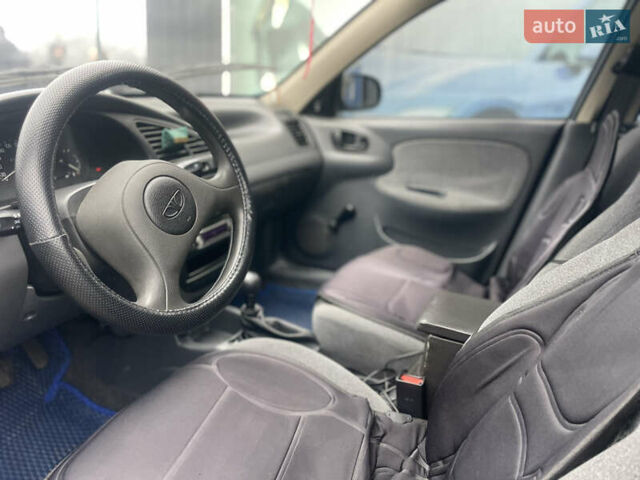 Синий Дэу Ланос, объемом двигателя 1.3 л и пробегом 126 тыс. км за 2199 $, фото 11 на Automoto.ua