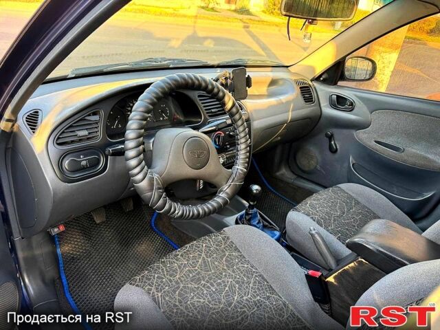 Синій Деу Ланос, об'ємом двигуна 1.5 л та пробігом 300 тис. км за 1999 $, фото 11 на Automoto.ua