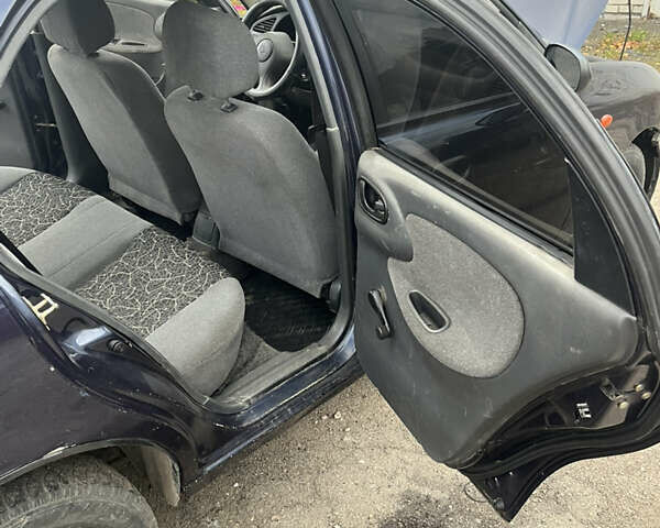 Синій Деу Ланос, об'ємом двигуна 1.5 л та пробігом 200 тис. км за 1250 $, фото 9 на Automoto.ua