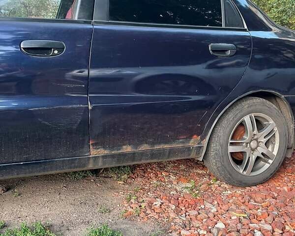 Синій Деу Ланос, об'ємом двигуна 1.5 л та пробігом 233 тис. км за 1000 $, фото 7 на Automoto.ua