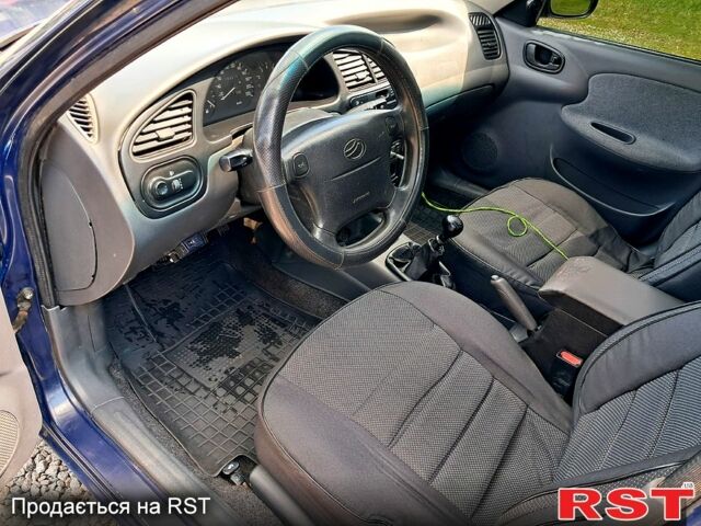 Синій Деу Ланос, об'ємом двигуна 1.5 л та пробігом 234 тис. км за 1900 $, фото 1 на Automoto.ua