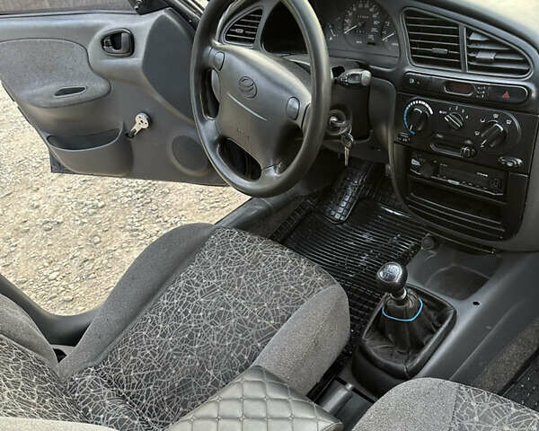 Синій Деу Ланос, об'ємом двигуна 1.5 л та пробігом 250 тис. км за 1400 $, фото 12 на Automoto.ua