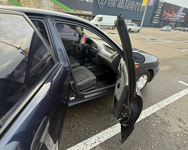 Синий Дэу Ланос, объемом двигателя 1.5 л и пробегом 340 тыс. км за 2400 $, фото 6 на Automoto.ua