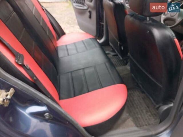 Деу Ланос 2006 у Харкові на Automoto.ua Синій Деу Ланос, об'ємом двигуна 1.5 л та пробігом 173 тис. км за 2790 $, фото 14 на Automoto.ua