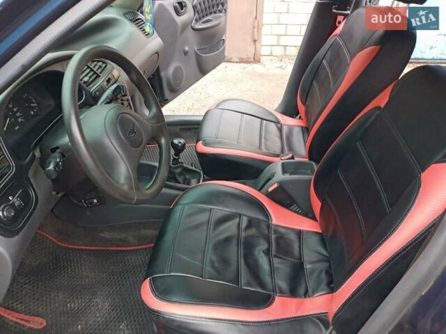 Деу Ланос 2006 у Харкові на Automoto.ua Синій Деу Ланос, об'ємом двигуна 1.5 л та пробігом 173 тис. км за 2790 $, фото 24 на Automoto.ua