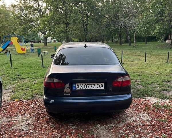 Синій Деу Ланос, об'ємом двигуна 1.5 л та пробігом 233 тис. км за 1000 $, фото 1 на Automoto.ua