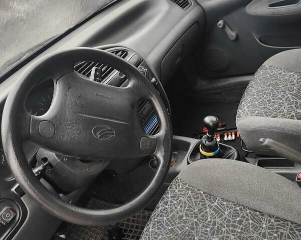 Синий Дэу Ланос, объемом двигателя 1.5 л и пробегом 200 тыс. км за 1600 $, фото 6 на Automoto.ua