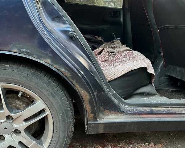 Синій Деу Ланос, об'ємом двигуна 1.5 л та пробігом 233 тис. км за 1000 $, фото 5 на Automoto.ua
