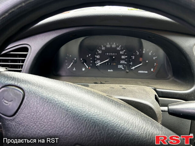 Синий Дэу Ланос, объемом двигателя 1.6 л и пробегом 283 тыс. км за 1000 $, фото 5 на Automoto.ua