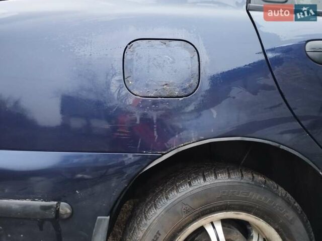 Синий Дэу Ланос, объемом двигателя 1.5 л и пробегом 217 тыс. км за 2200 $, фото 14 на Automoto.ua