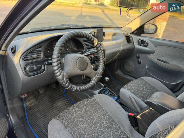 Синій Деу Ланос, об'ємом двигуна 1.5 л та пробігом 300 тис. км за 1999 $, фото 12 на Automoto.ua