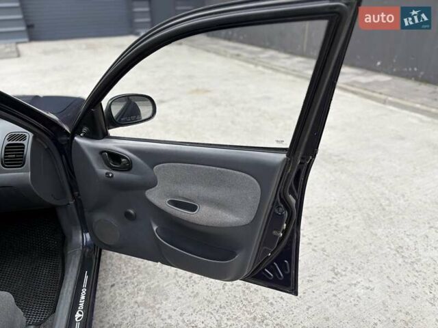 Синий Дэу Ланос, объемом двигателя 1.5 л и пробегом 219 тыс. км за 1350 $, фото 12 на Automoto.ua