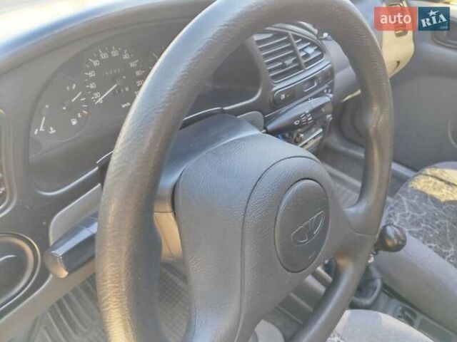 Синий Дэу Ланос, объемом двигателя 1.5 л и пробегом 152 тыс. км за 2500 $, фото 10 на Automoto.ua
