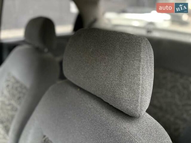 Синий Дэу Ланос, объемом двигателя 1.5 л и пробегом 219 тыс. км за 1350 $, фото 9 на Automoto.ua