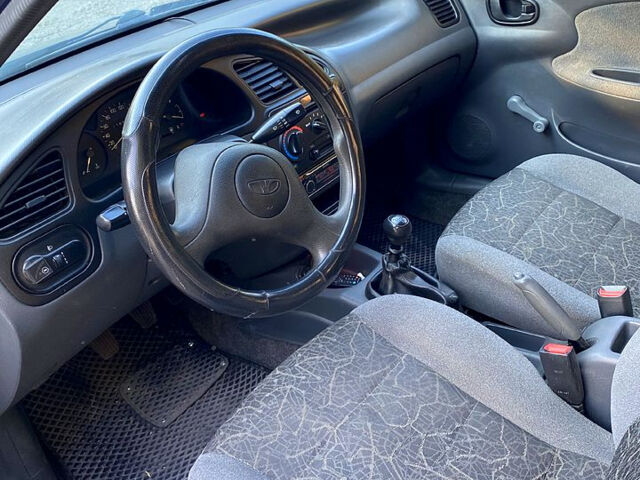 Синий Дэу Ланос, объемом двигателя 1.5 л и пробегом 120 тыс. км за 1900 $, фото 8 на Automoto.ua