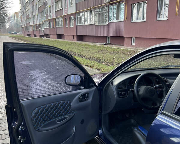 Синий Дэу Ланос, объемом двигателя 1.5 л и пробегом 130 тыс. км за 3400 $, фото 9 на Automoto.ua