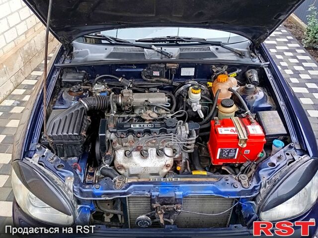 Синий Дэу Ланос, объемом двигателя 1.5 л и пробегом 187 тыс. км за 2250 $, фото 2 на Automoto.ua