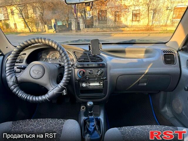 Синій Деу Ланос, об'ємом двигуна 1.5 л та пробігом 300 тис. км за 1999 $, фото 12 на Automoto.ua