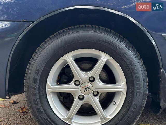 Синий Дэу Ланос, объемом двигателя 1.45 л и пробегом 211 тыс. км за 2600 $, фото 13 на Automoto.ua