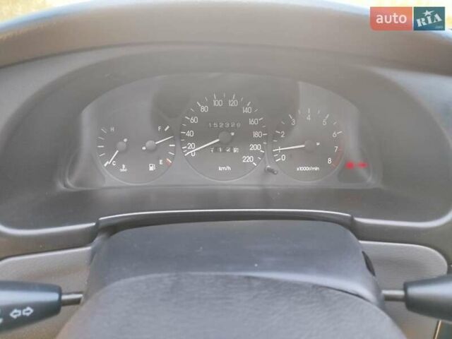 Синий Дэу Ланос, объемом двигателя 1.5 л и пробегом 152 тыс. км за 2500 $, фото 12 на Automoto.ua