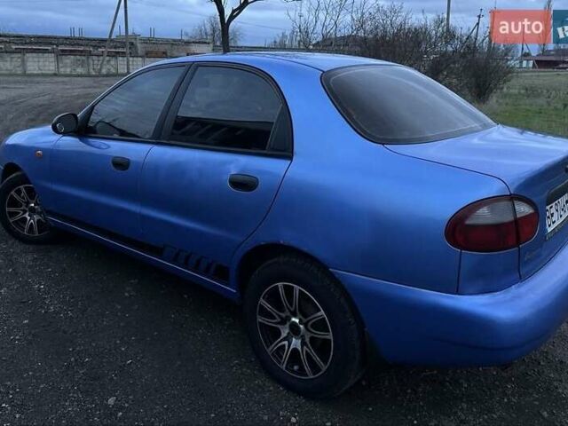 Синий Дэу Ланос, объемом двигателя 1.5 л и пробегом 230 тыс. км за 2400 $, фото 3 на Automoto.ua