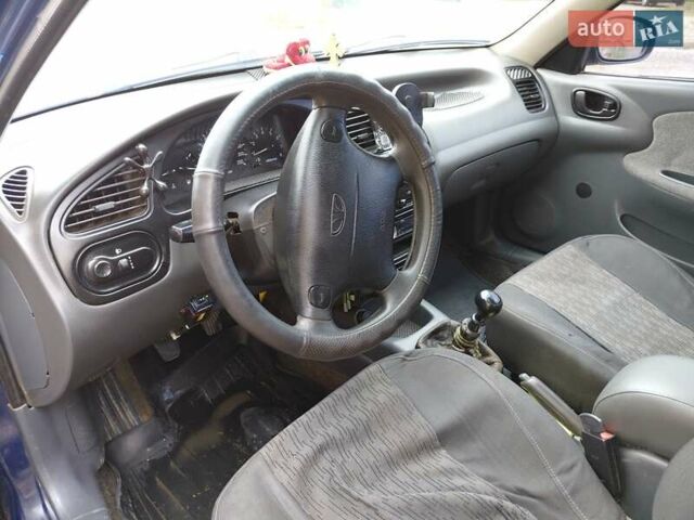 Синій Деу Ланос, об'ємом двигуна 1.5 л та пробігом 301 тис. км за 2650 $, фото 4 на Automoto.ua