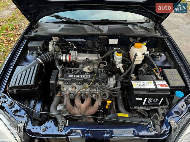Синий Дэу Ланос, объемом двигателя 1.45 л и пробегом 211 тыс. км за 2800 $, фото 11 на Automoto.ua