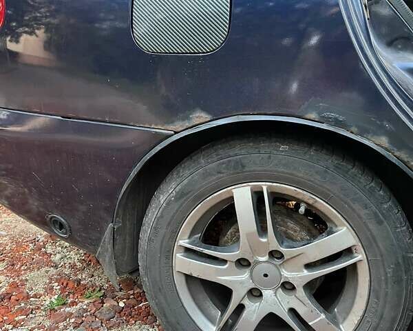 Синій Деу Ланос, об'ємом двигуна 1.5 л та пробігом 233 тис. км за 1000 $, фото 4 на Automoto.ua