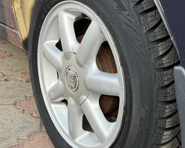 Синій Деу Ланос, об'ємом двигуна 1.5 л та пробігом 300 тис. км за 1999 $, фото 14 на Automoto.ua