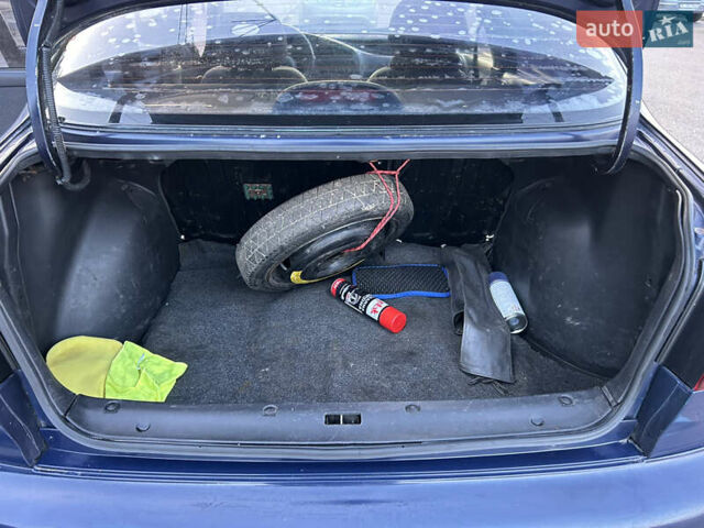 Синій Деу Ланос, об'ємом двигуна 1.5 л та пробігом 340 тис. км за 1850 $, фото 10 на Automoto.ua
