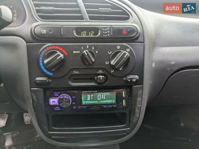 Синий Дэу Ланос, объемом двигателя 1.5 л и пробегом 172 тыс. км за 1450 $, фото 10 на Automoto.ua