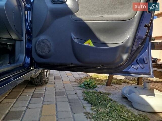 Синий Дэу Ланос, объемом двигателя 1.5 л и пробегом 152 тыс. км за 2500 $, фото 23 на Automoto.ua