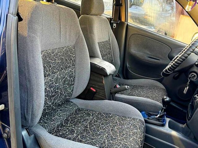 Синій Деу Ланос, об'ємом двигуна 1.5 л та пробігом 300 тис. км за 1999 $, фото 9 на Automoto.ua