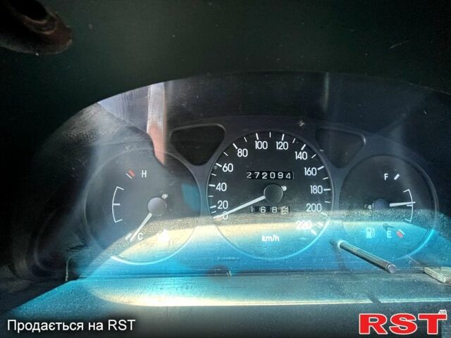 Синій Деу Ланос, об'ємом двигуна 1.3 л та пробігом 272 тис. км за 1600 $, фото 6 на Automoto.ua