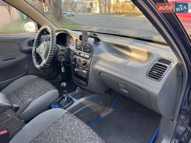 Синій Деу Ланос, об'ємом двигуна 1.5 л та пробігом 300 тис. км за 1999 $, фото 10 на Automoto.ua