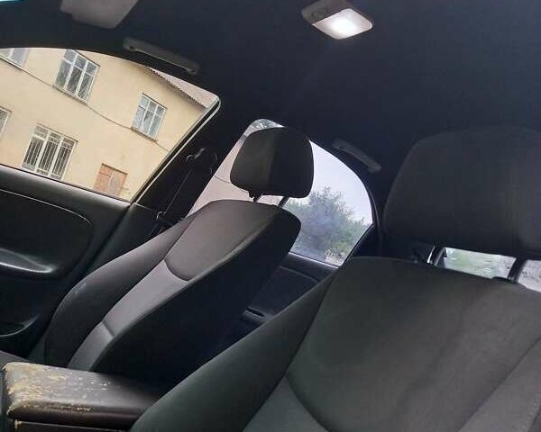 Синий Дэу Ланос, объемом двигателя 1.5 л и пробегом 270 тыс. км за 1200 $, фото 12 на Automoto.ua