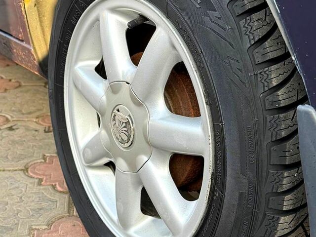 Синій Деу Ланос, об'ємом двигуна 1.5 л та пробігом 300 тис. км за 1999 $, фото 10 на Automoto.ua