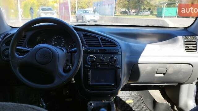 Синий Дэу Ланос, объемом двигателя 1.5 л и пробегом 300 тыс. км за 1150 $, фото 1 на Automoto.ua