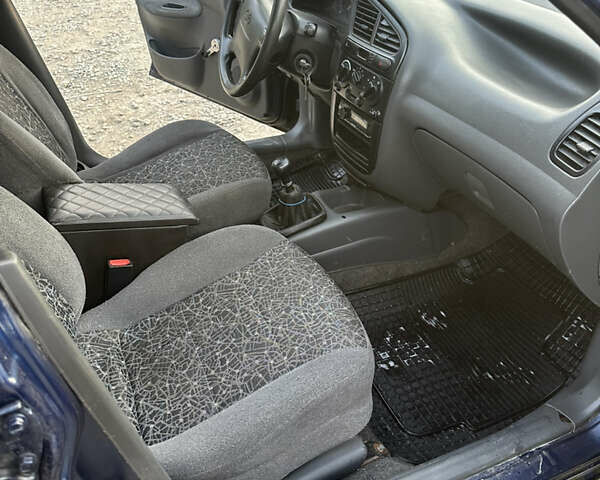 Синій Деу Ланос, об'ємом двигуна 1.5 л та пробігом 250 тис. км за 1400 $, фото 11 на Automoto.ua