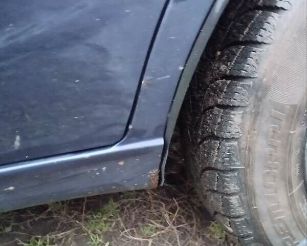 Синий Дэу Ланос, объемом двигателя 1.5 л и пробегом 217 тыс. км за 2200 $, фото 12 на Automoto.ua