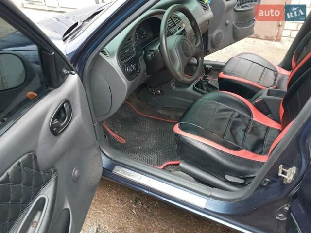 Деу Ланос 2006 у Харкові на Automoto.ua Синій Деу Ланос, об'ємом двигуна 1.5 л та пробігом 173 тис. км за 2790 $, фото 21 на Automoto.ua