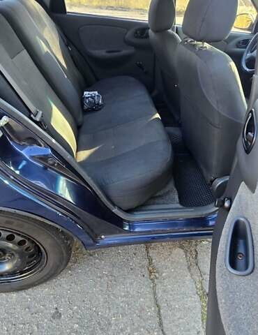 Синий Дэу Ланос, объемом двигателя 1.5 л и пробегом 345 тыс. км за 1800 $, фото 4 на Automoto.ua