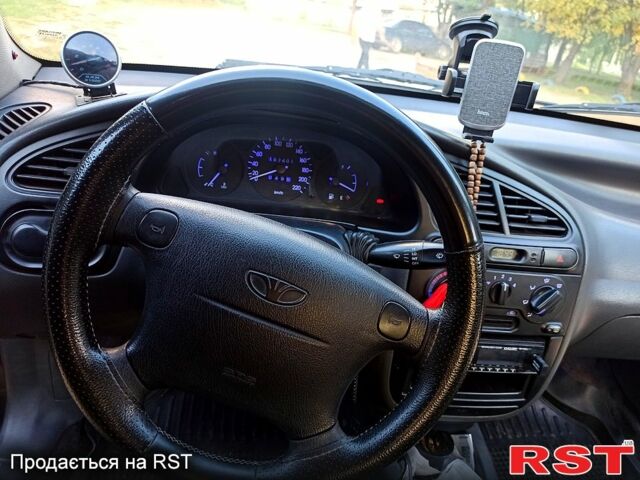 Синій Деу Ланос, об'ємом двигуна 1.5 л та пробігом 191 тис. км за 2200 $, фото 14 на Automoto.ua