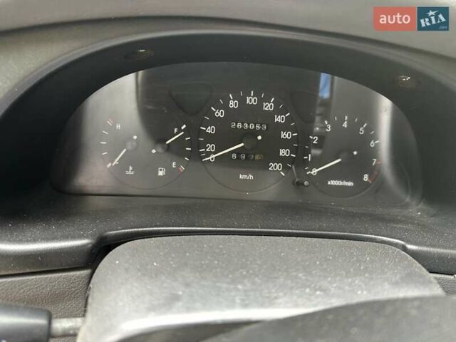 Синий Дэу Ланос, объемом двигателя 1.5 л и пробегом 263 тыс. км за 1200 $, фото 1 на Automoto.ua