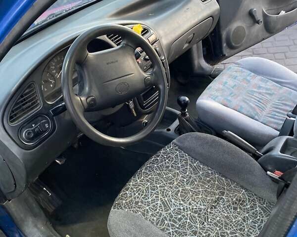 Синій Деу Ланос, об'ємом двигуна 1.5 л та пробігом 280 тис. км за 1100 $, фото 4 на Automoto.ua